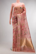 Golden Peach Organza Saree with Printed design on the body and Fancy Border.  displayed on a mannequin