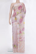 Rose Gold Organza Saree with Floral Print on the body and Fancy Border.  displayed on a mannequin