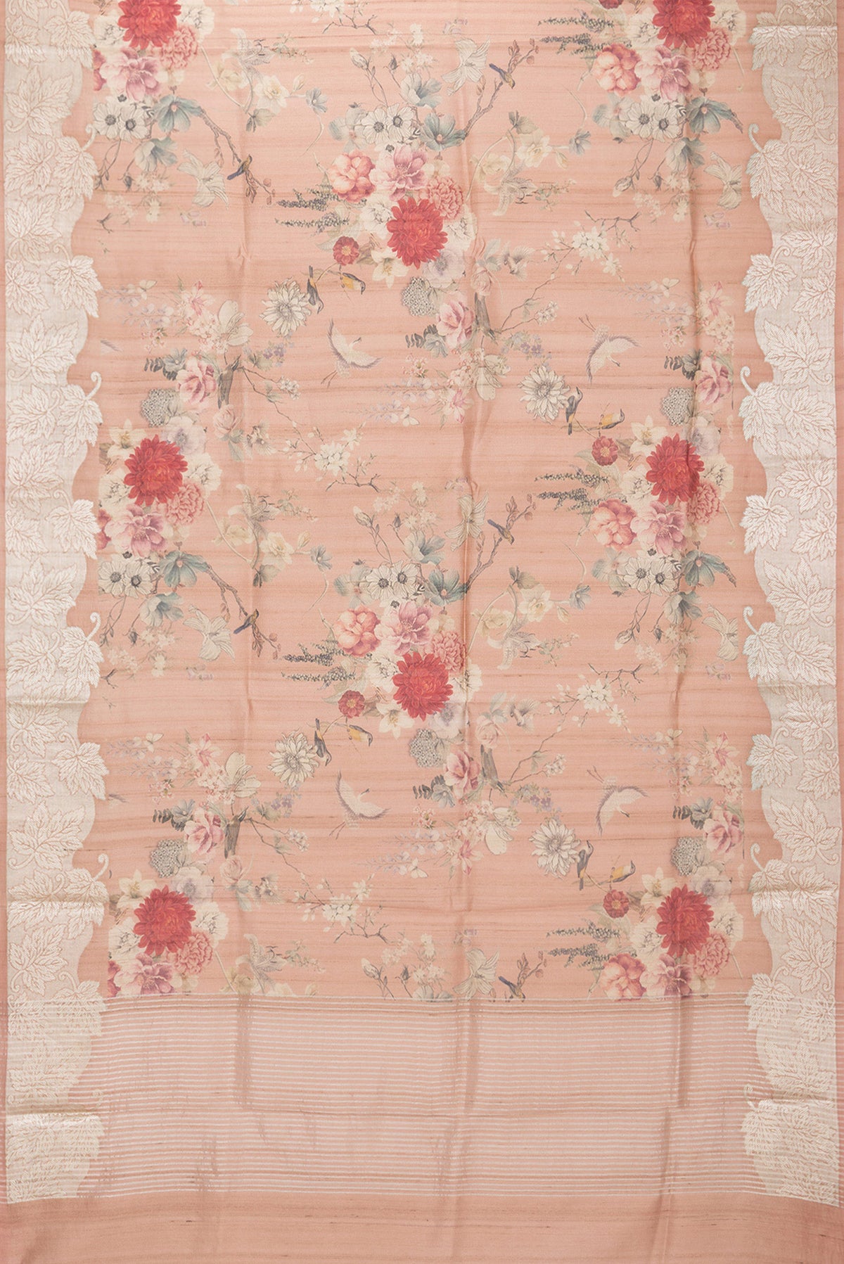 Flat view of Rose Gold Tussar Saree with Floral Print on the body and Zari Border. 
