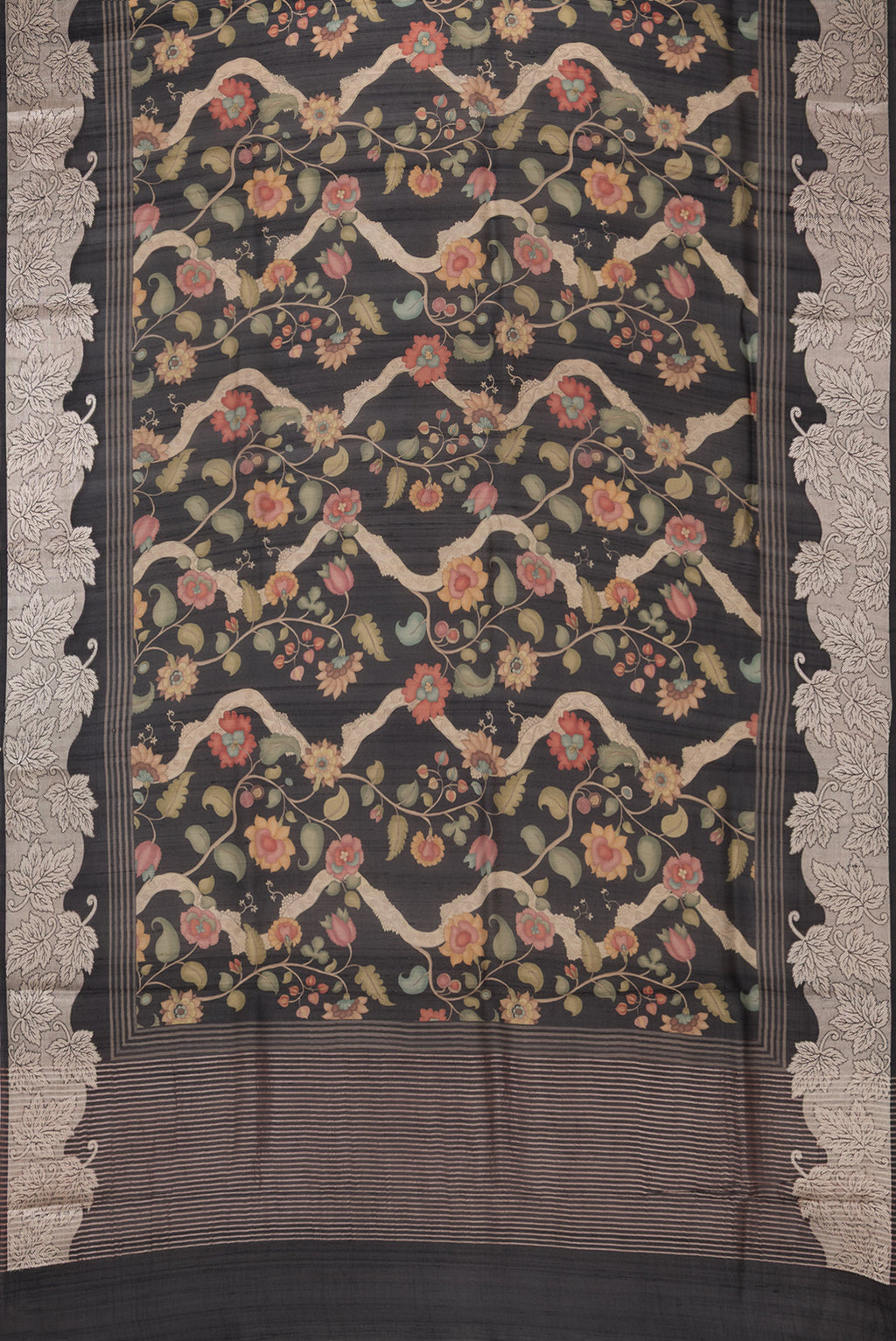 Flat view of Pure Silk Black Tussar Saree with Printed design on the body and Fancy Border. 