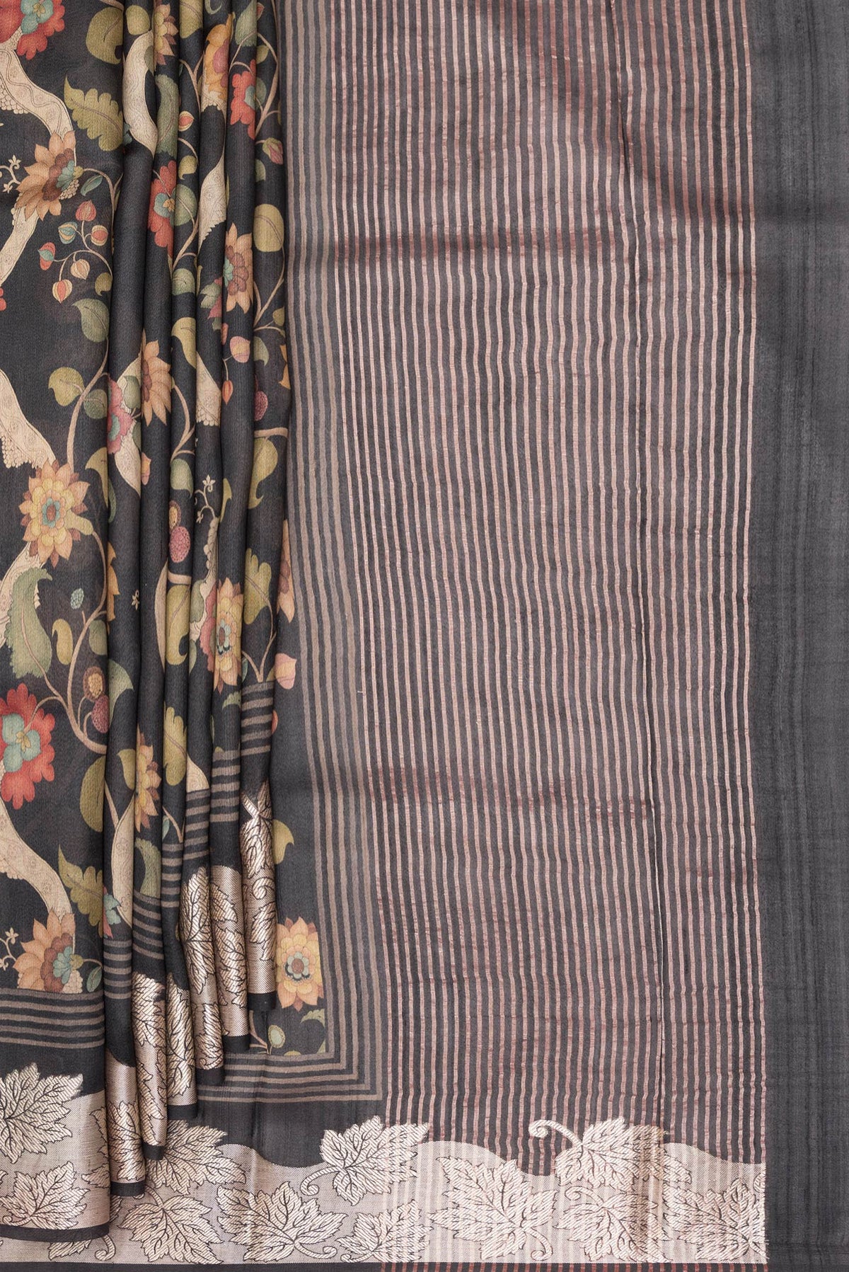 Pleats and pallu of Pure Silk Black Tussar Saree with Printed design on the body and Fancy Border. 