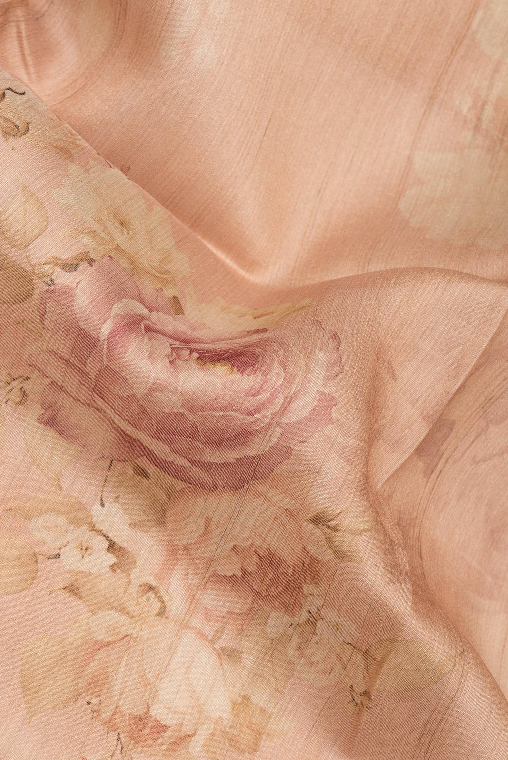 Close up of Sandal Tussar Saree with Floral Print on the body and Fancy Border.  displaying folds