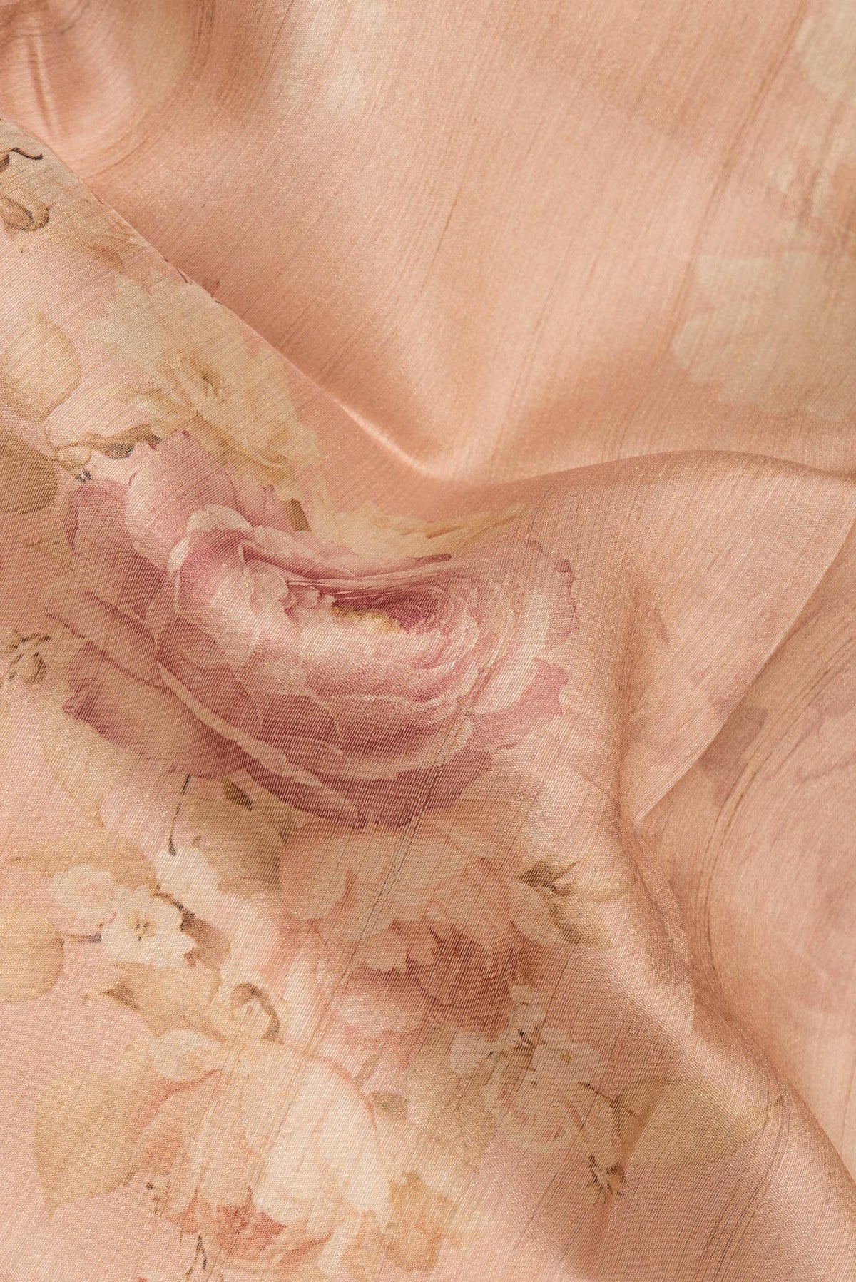 Close up of Sandal Tussar Saree with Floral Print on the body and Fancy Border.  displaying folds