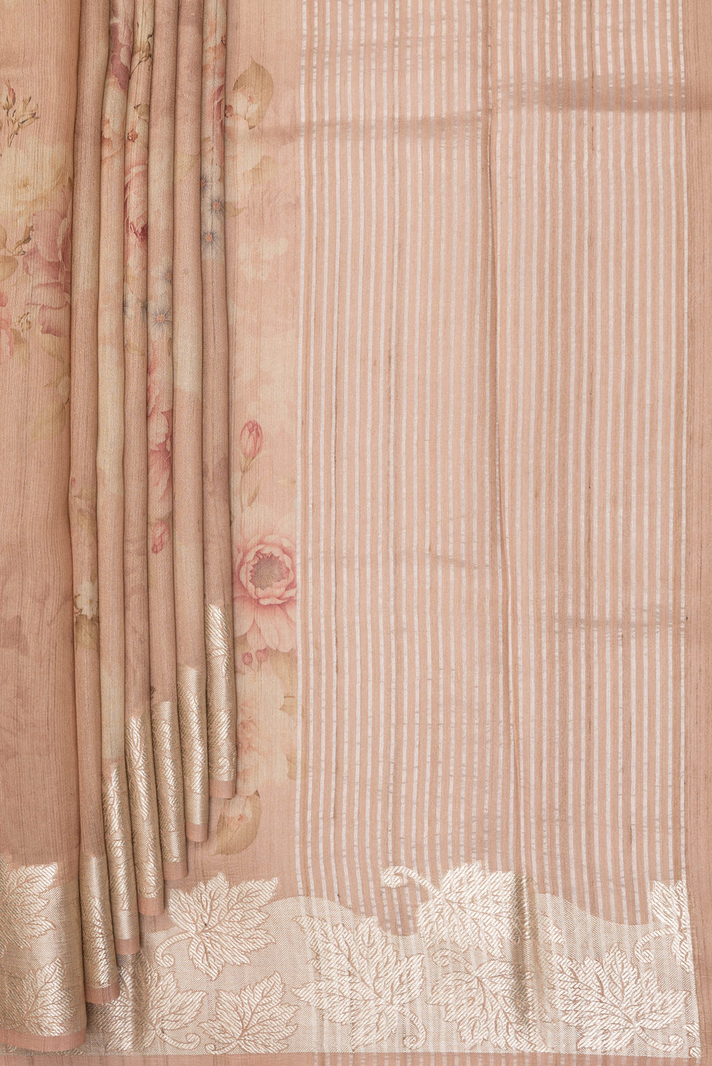 Pleats and pallu of Sandal Tussar Saree with Floral Print on the body and Fancy Border. 