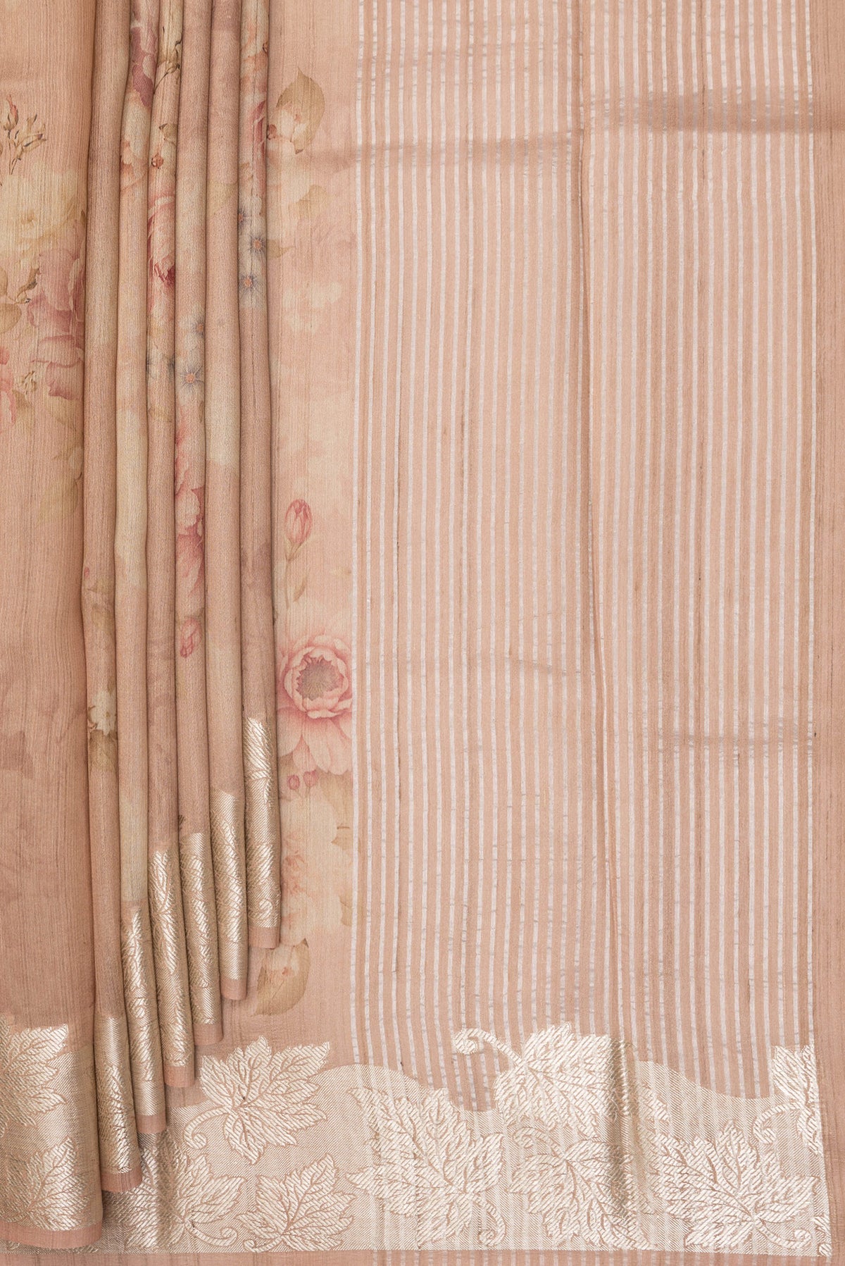 Pleats and pallu of Sandal Tussar Saree with Floral Print on the body and Fancy Border. 
