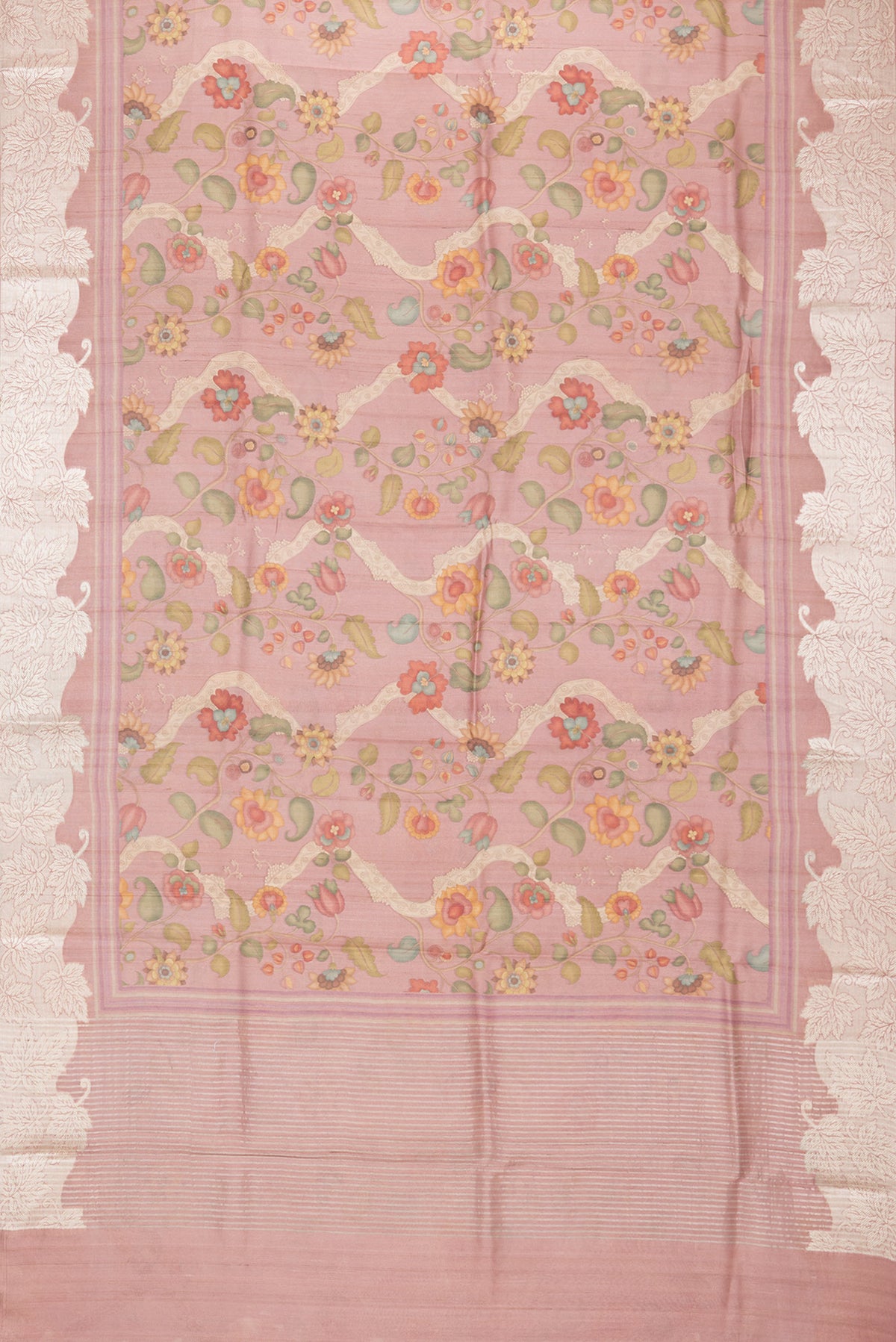 Flat view of Peach Tussar Saree with Printed design on the body and Zari Border. 