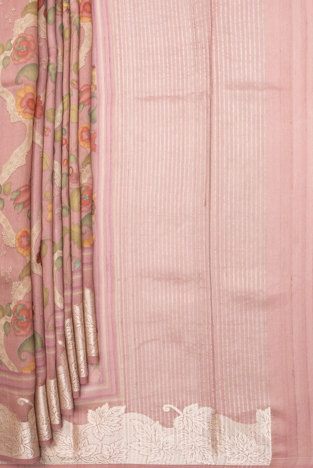 Pleats and pallu of Peach Tussar Saree with Printed design on the body and Zari Border. 