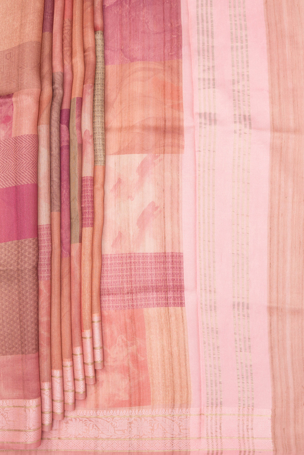 Pleats and pallu of Multi Color Tussar Saree with Printed design on the body and Thread Border. 