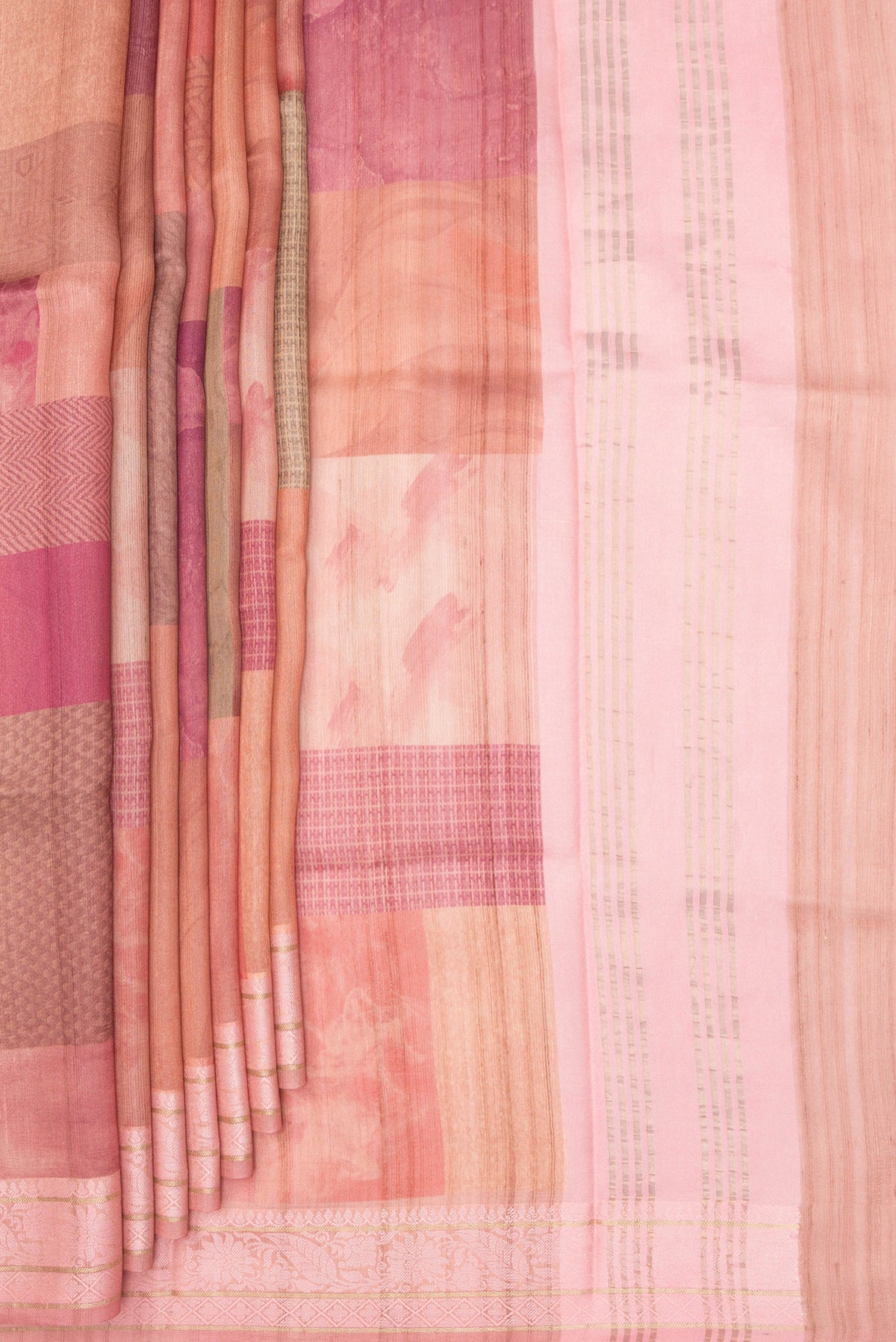 Pleats and pallu of Multi Color Tussar Saree with Printed design on the body and Thread Border. 