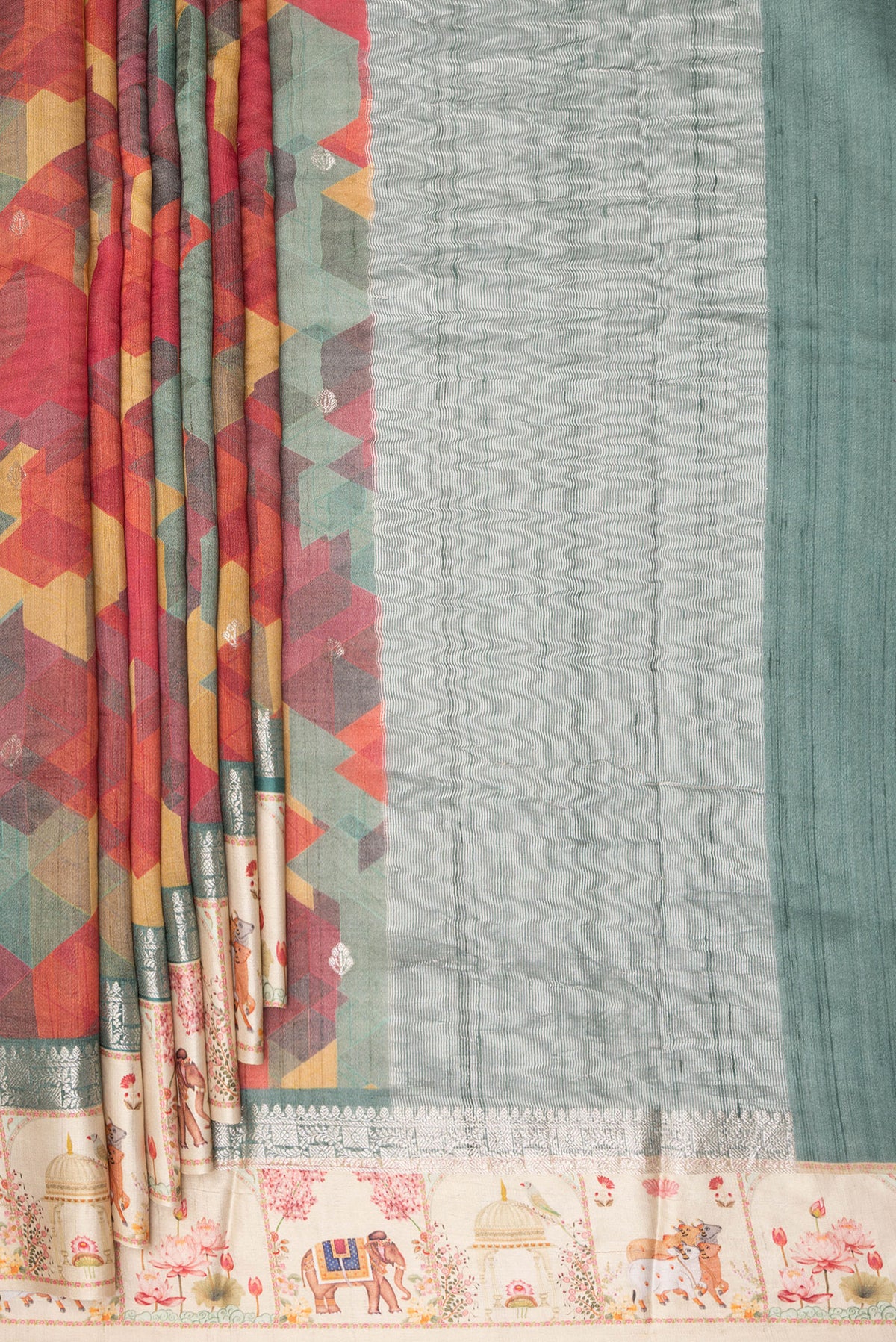Pleats and pallu of Multi Color Tussar Saree with Printed design on the body and Fancy Border. 