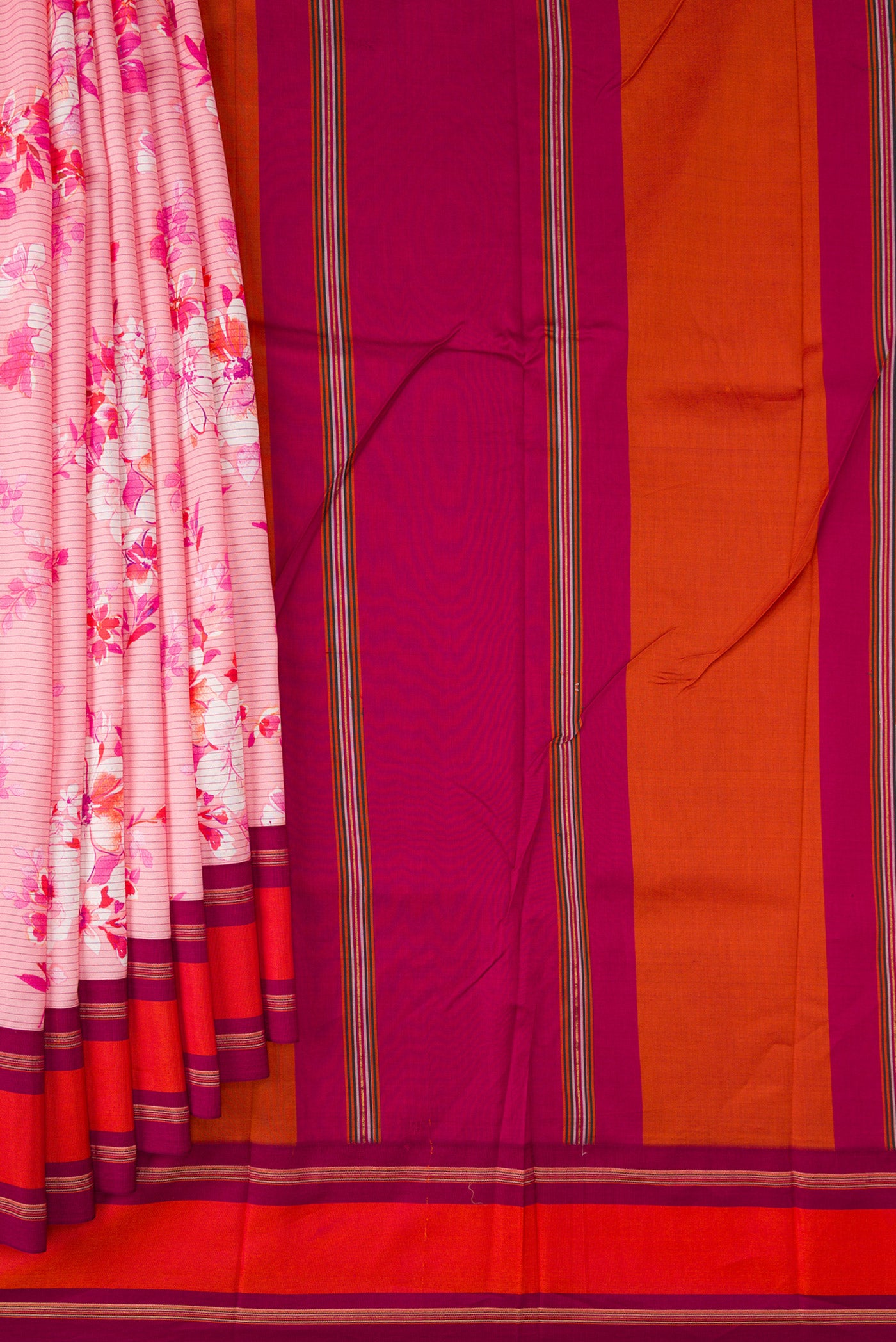 Pleats and pallu of Pink Kanchipuram Silk Saree with Printed design on the body and Plain Border. 