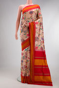 Peach Kanchipuram Silk Saree with Printed design on the body and Plain Border.  displayed on a mannequin