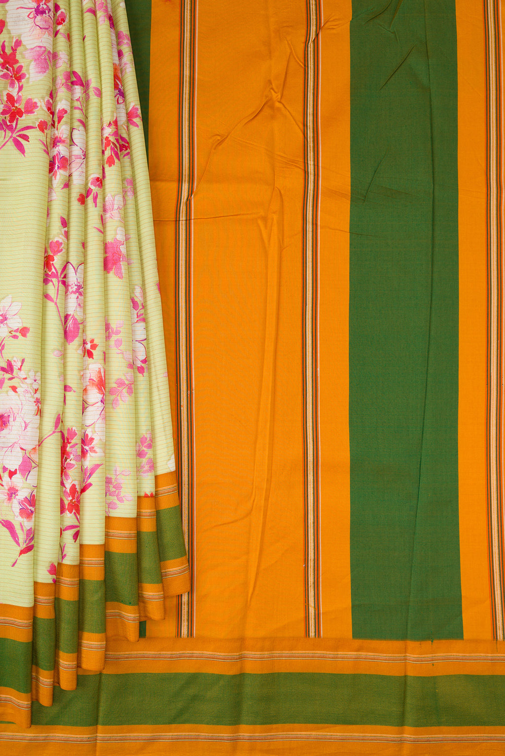 Pleats and pallu of Pista Green Kanchipuram Silk Saree with Printed design on the body and Plain Border. 