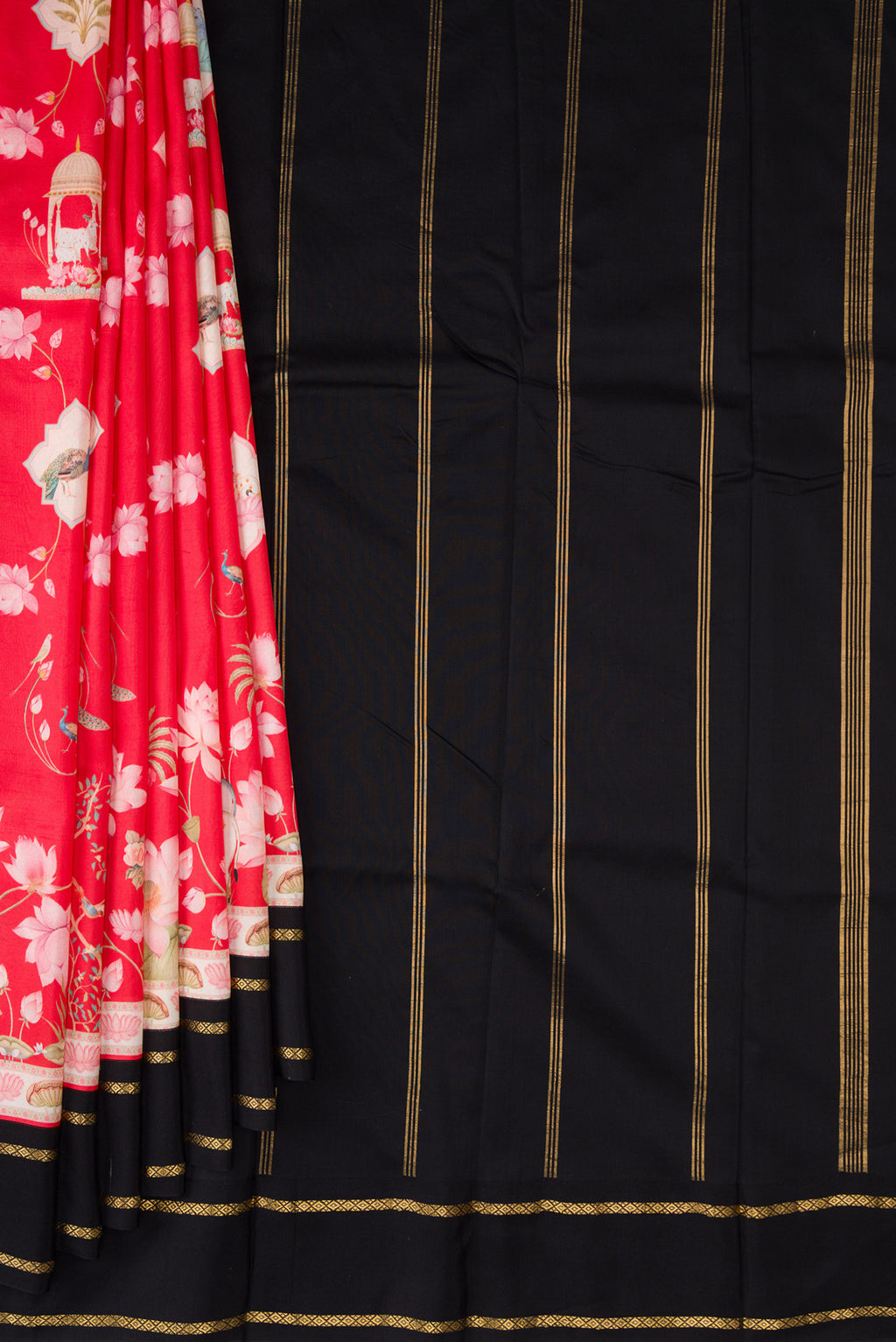 Pleats and pallu of Red Kanchipuram Silk Saree with Printed design on the body and Plain Border. 