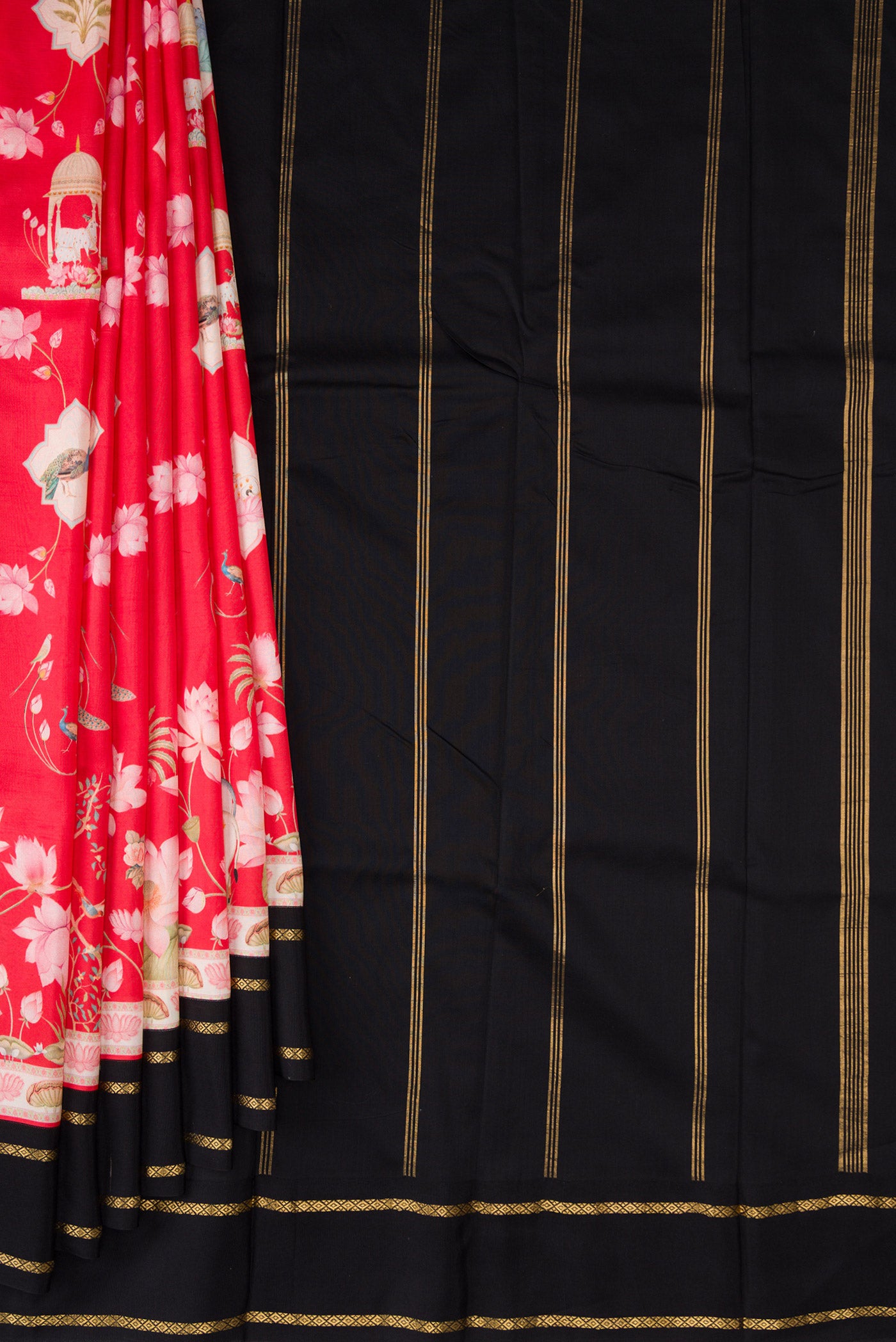 Pleats and pallu of Red Kanchipuram Silk Saree with Printed design on the body and Plain Border. 