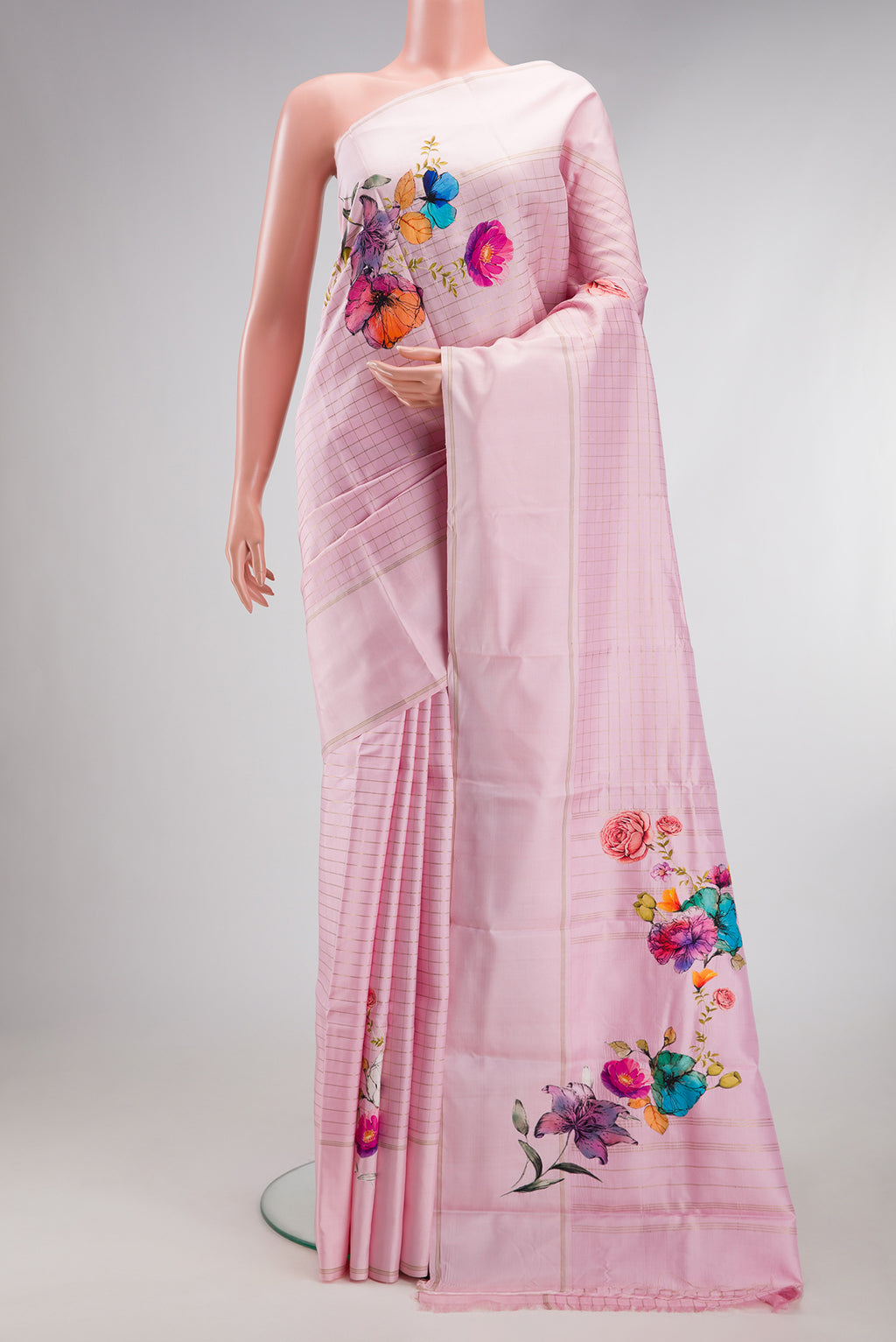 Rose pink Kanchipuram Silk Saree with Checked design on the body and Fancy Border.  displayed on a mannequin