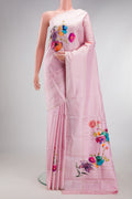 Rose pink Kanchipuram Silk Saree with Checked design on the body and Fancy Border.  displayed on a mannequin