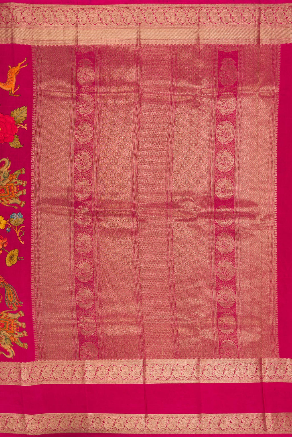 Close up image of the pallu of Dark Pink Kanchipuram Silk Saree with Printed design on the body and Zari Border. 