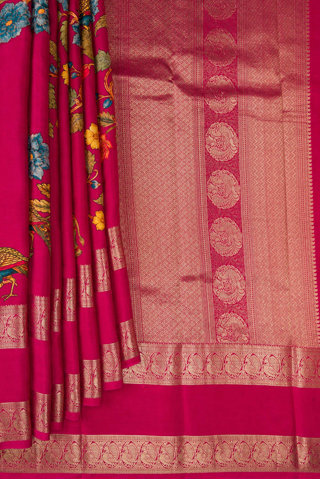 Pleats and pallu of Dark Pink Kanchipuram Silk Saree with Printed design on the body and Zari Border. 