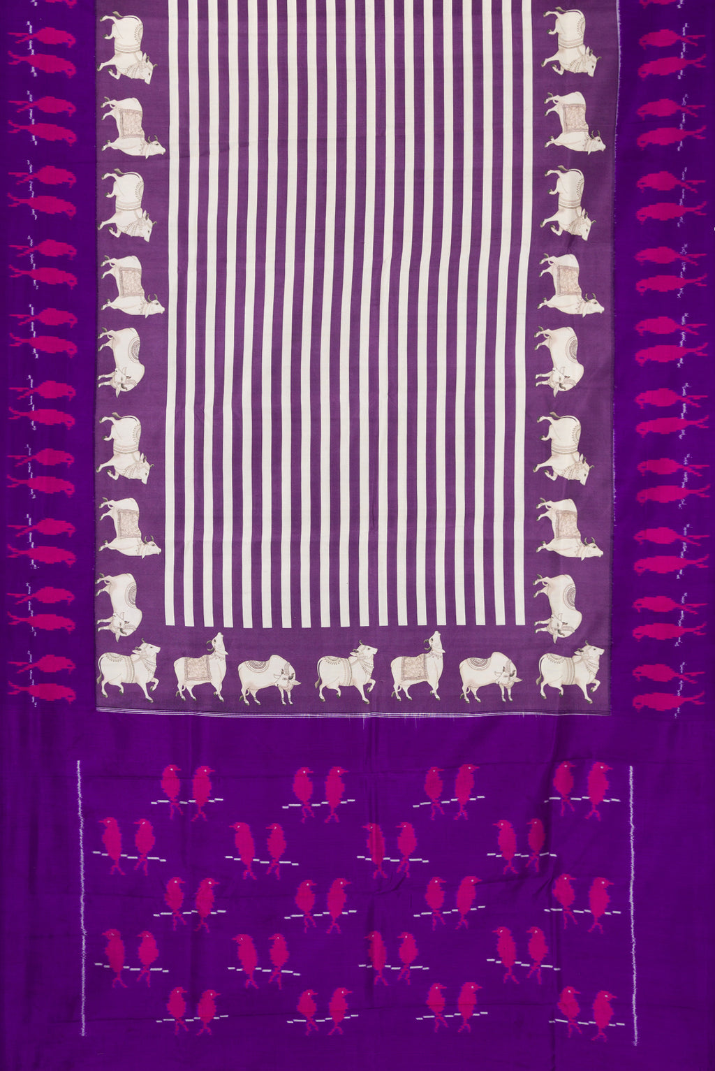 Flat view of Purple Kanchipuram Silk Saree with Printed design on the body and Ikat Border. 