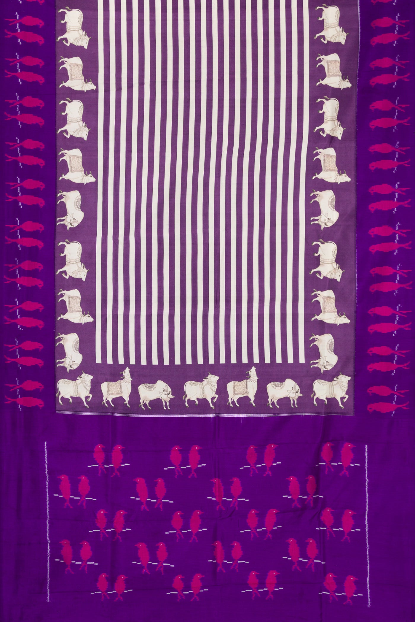 Flat view of Purple Kanchipuram Silk Saree with Printed design on the body and Ikat Border. 