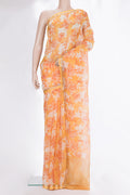 Orange Organza Saree with Floral Print on the body and Zari And Thread Border.  displayed on a mannequin