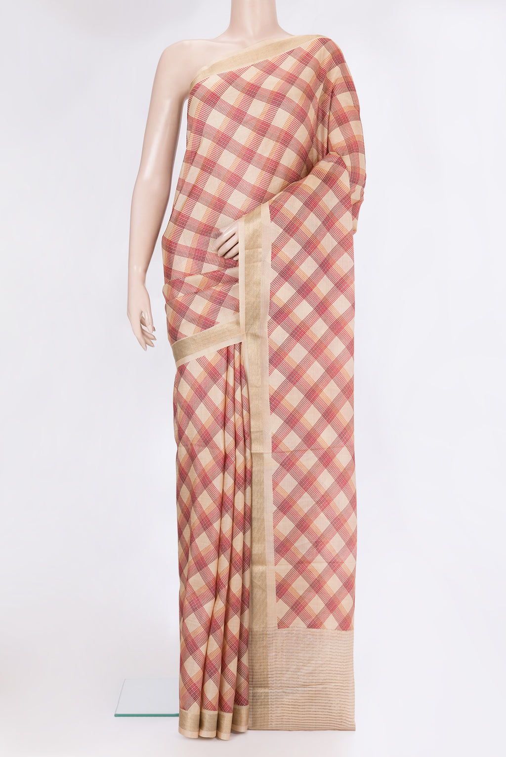 Beige Tussar Silk Saree with Checked design on the body and Zari Border.  displayed on a mannequin