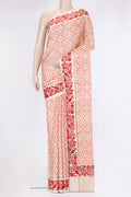 Beige Tussar Silk Saree with Bandhani Print on the body and Fancy Border.  displayed on a mannequin
