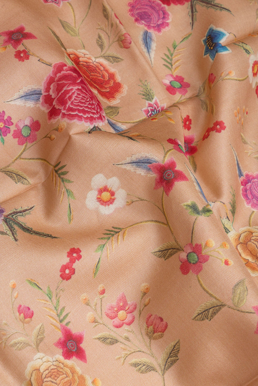 Close up of Dark Beige Tussar Silk Saree with Printed design on the body and Fancy Border.  displaying folds