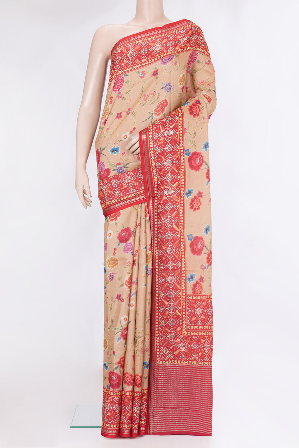Dark Beige Tussar Silk Saree with Printed design on the body and Fancy Border.  displayed on a mannequin