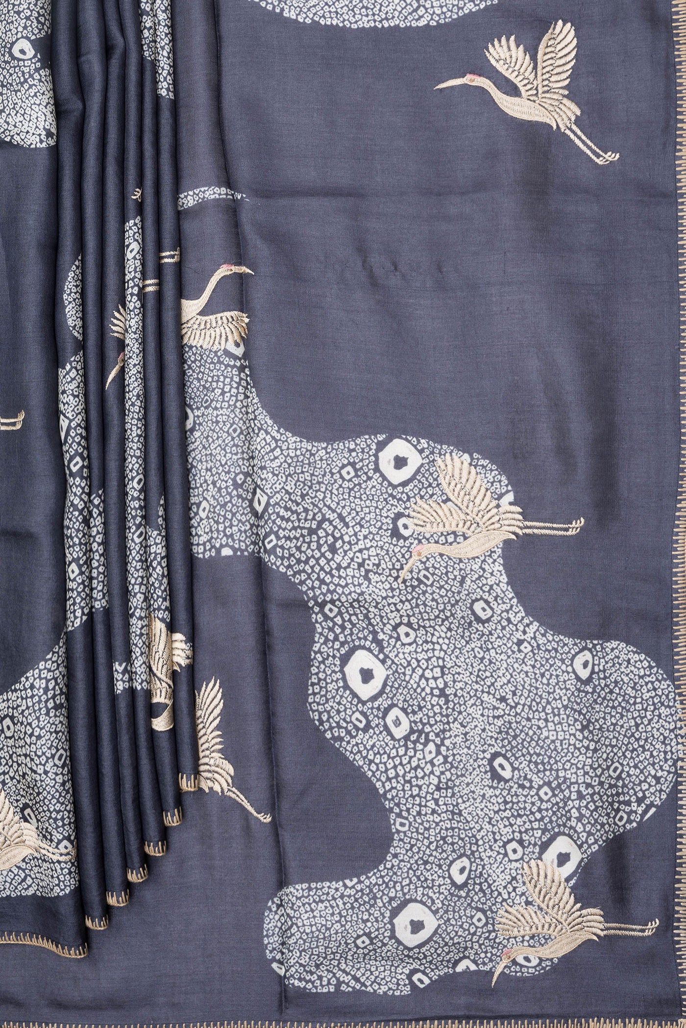 Pleats and pallu of Navy Blue Tussar Silk Saree with Embroidery on the body and Embroidery Border. 