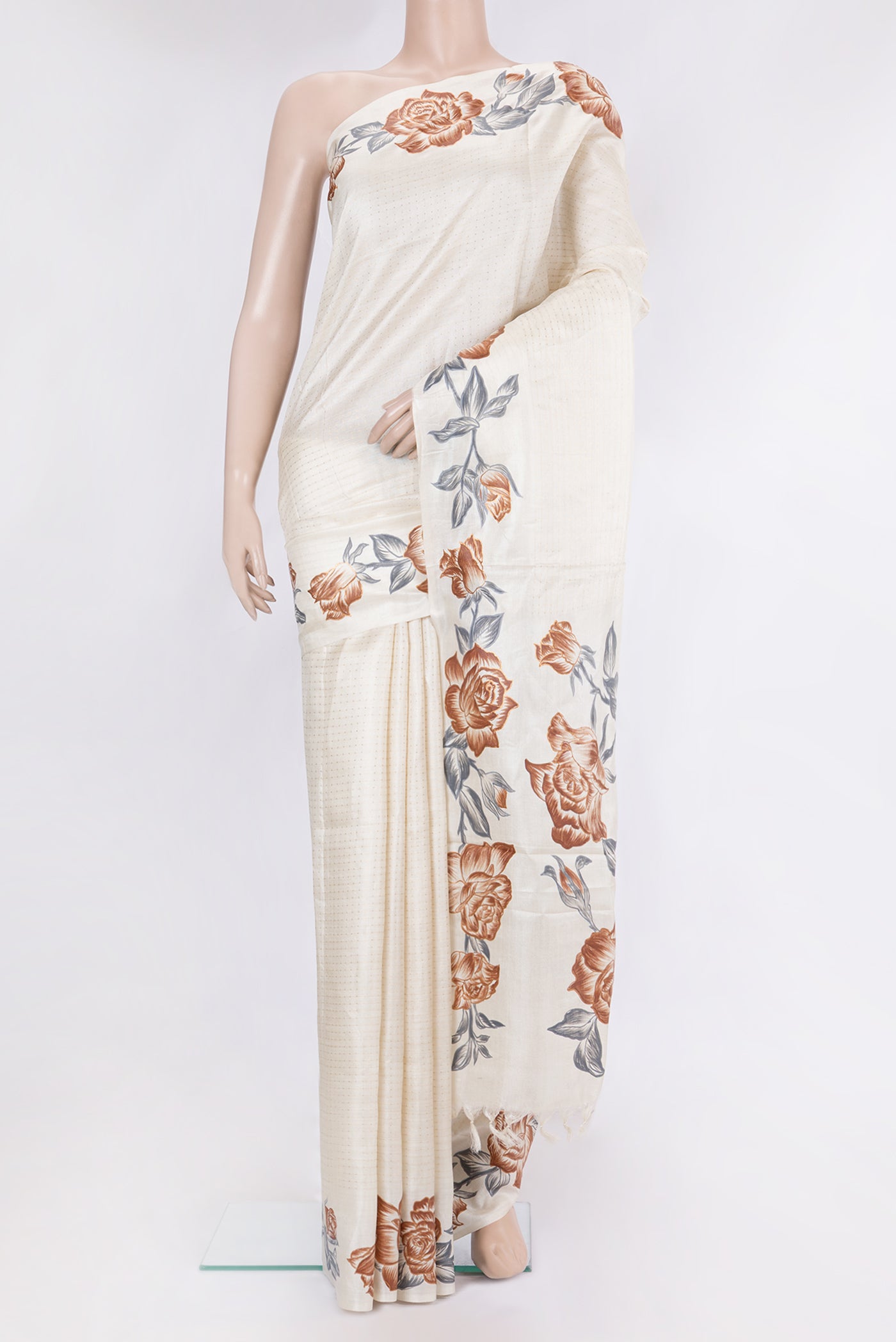 Off White Tussar Silk Saree with Stripes on the body and Fancy Border.  displayed on a mannequin
