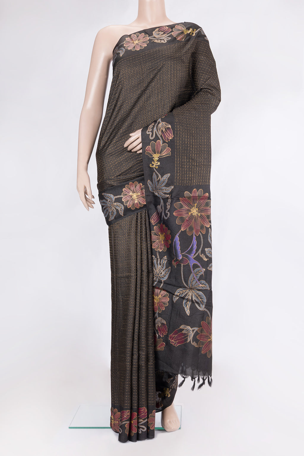 Black Tussar Silk Saree with Checked design on the body and Fancy Border.  displayed on a mannequin