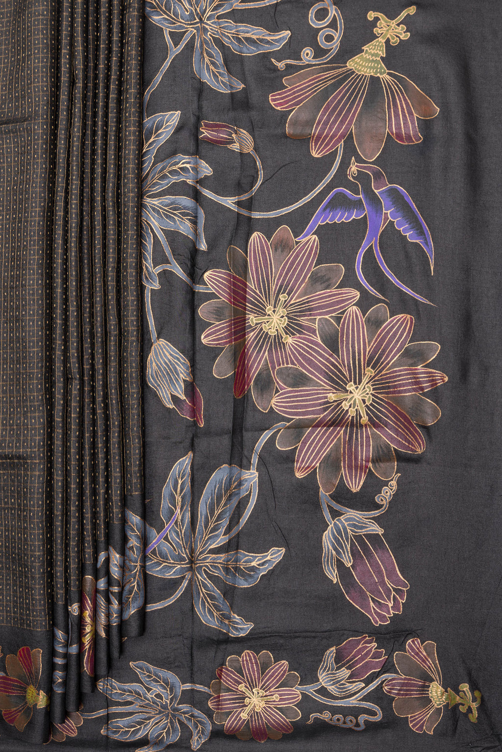 Pleats and pallu of Black Tussar Silk Saree with Checked design on the body and Fancy Border. 
