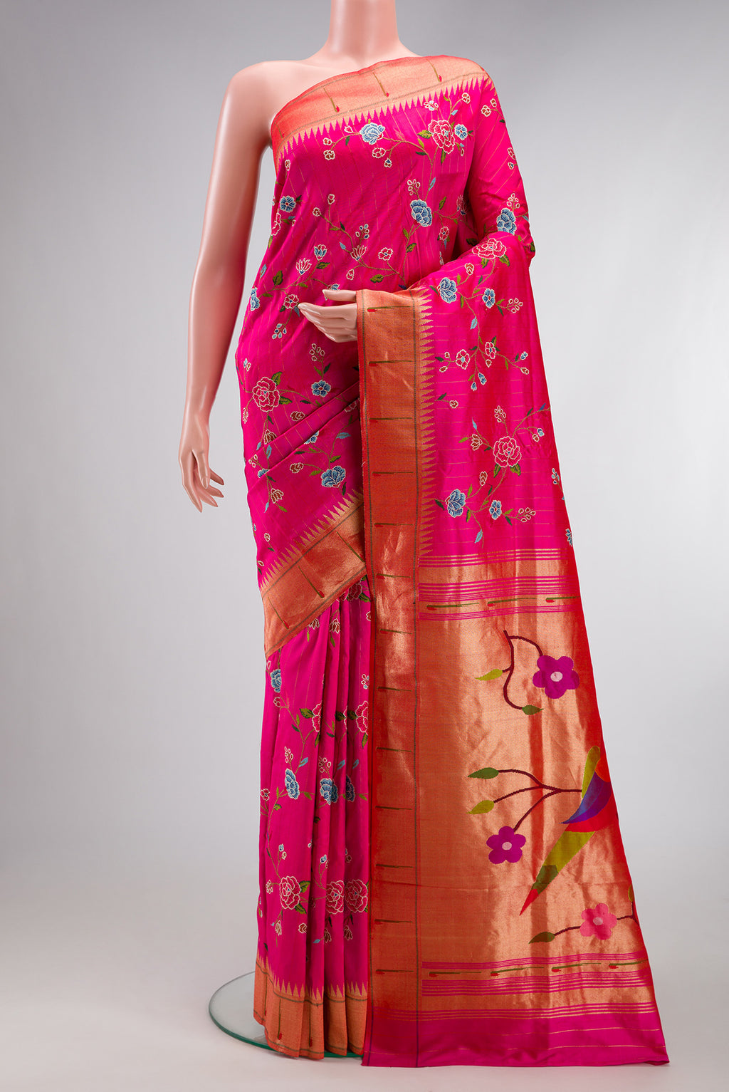 Pink Paithani Silk Saree with Embroidery on the body and Paithani Border.  displayed on a mannequin
