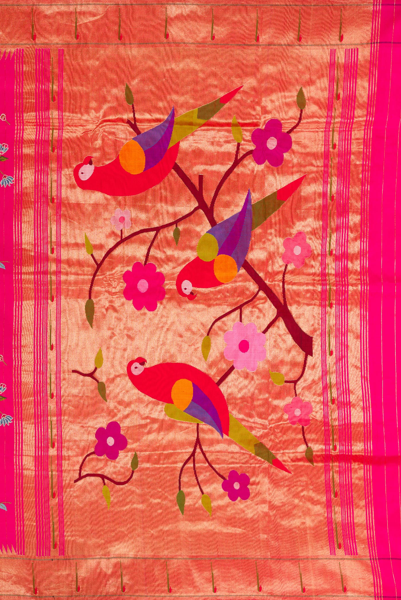 Close up image of the pallu of Pink Paithani Silk Saree with Embroidery on the body and Paithani Border. 