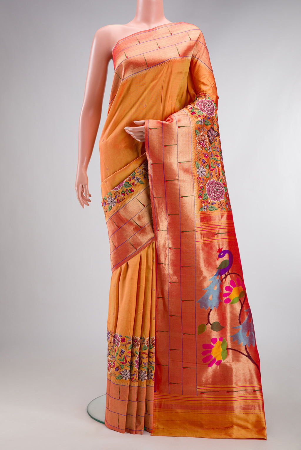 Mustard Dual Tone Paithani Silk Saree with Embroidery on the body and Paithani Border.  displayed on a mannequin