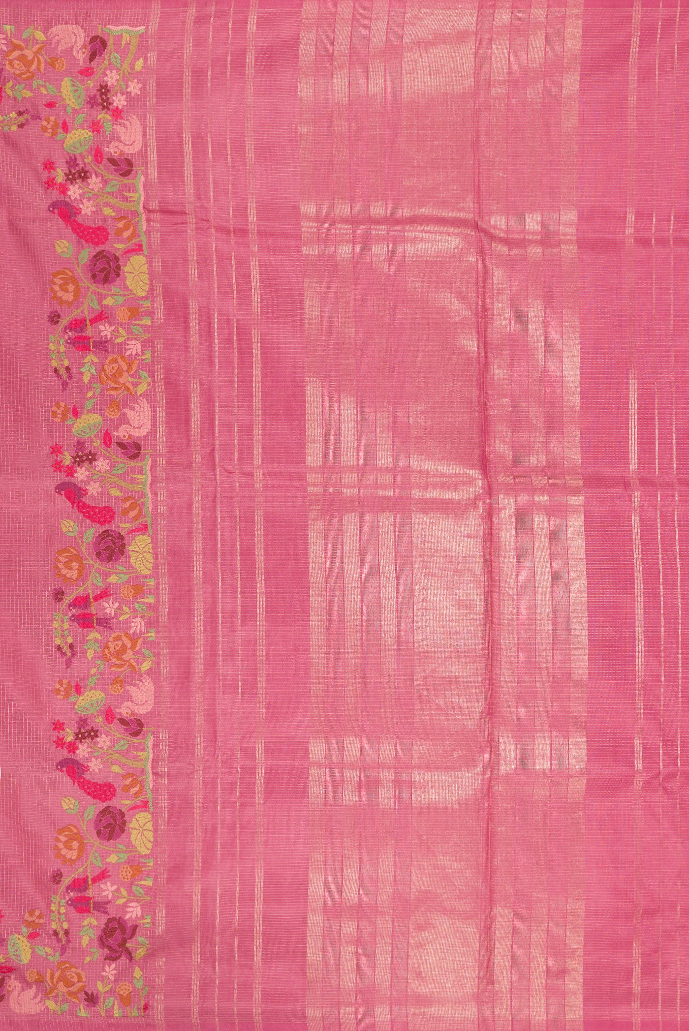 Close up image of the pallu of Pink Kanchipuram Silk Saree with Zari Brocade on the body and Embroidery Border. 