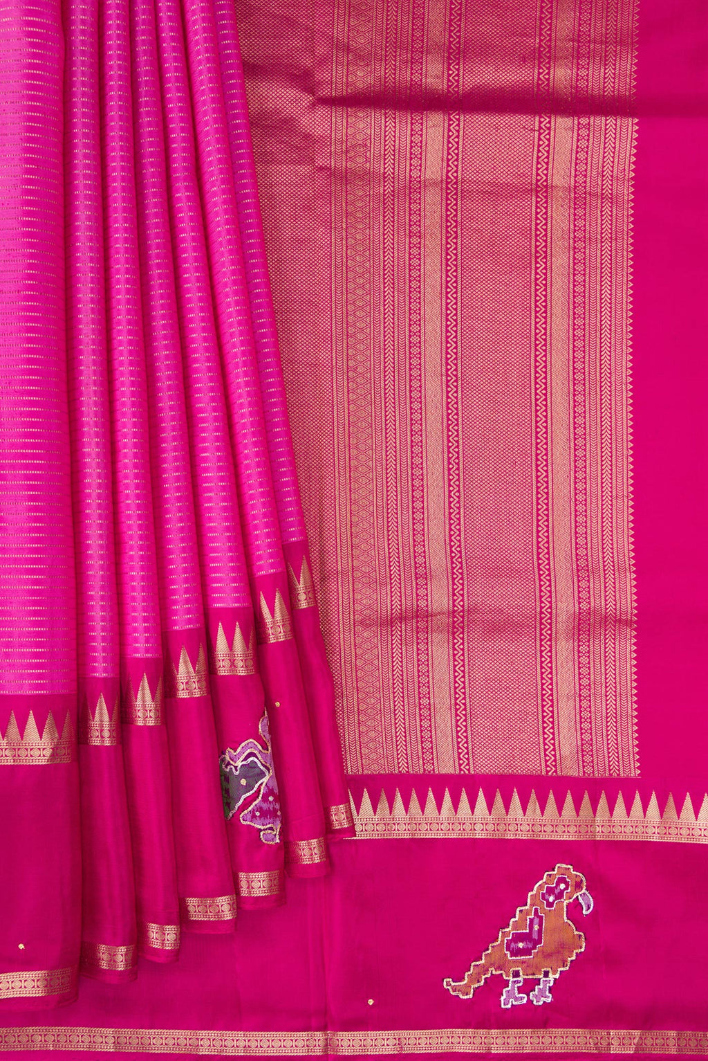 Pleats and pallu of Rose pink Kanchipuram Silk Saree with Stripes on the body and Fancy Border. 
