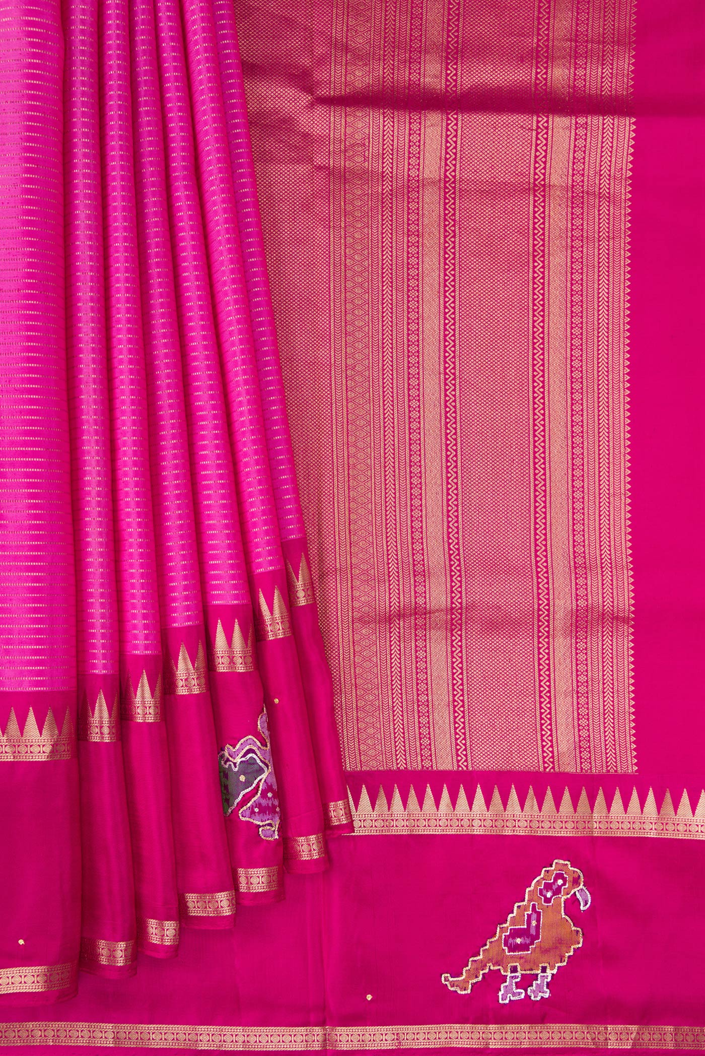 Pleats and pallu of Rose pink Kanchipuram Silk Saree with Stripes on the body and Fancy Border. 