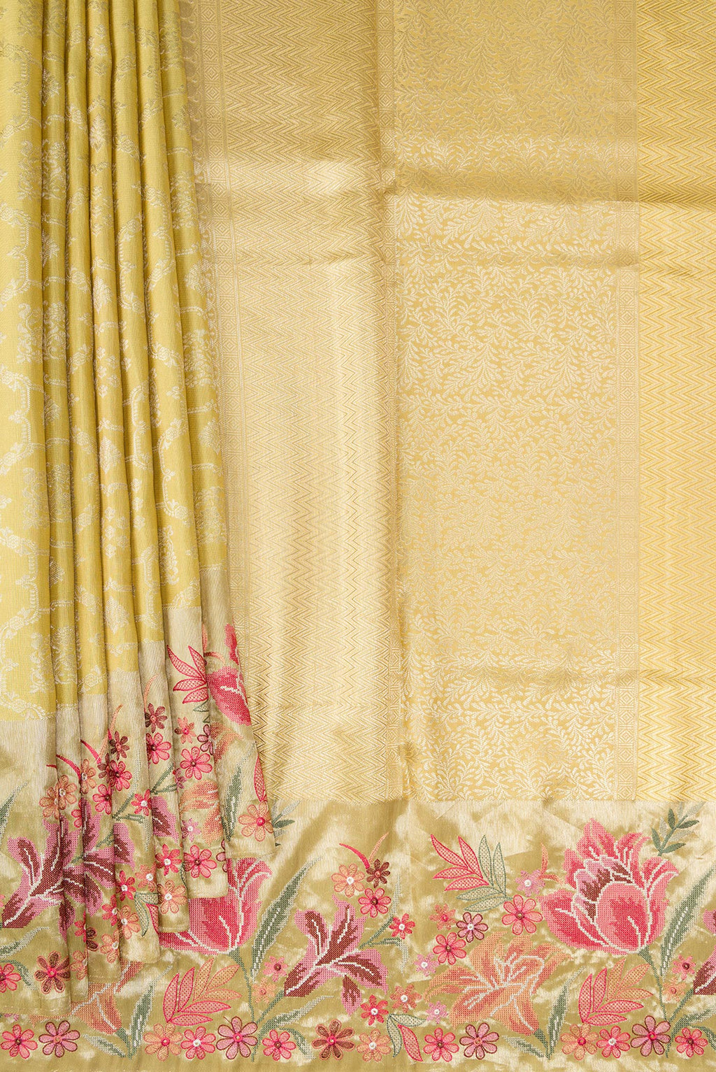 Pleats and pallu of Sandal Dual Tone Kanchipuram Silk Saree with Zari Brocade on the body and Embroidery Border. 