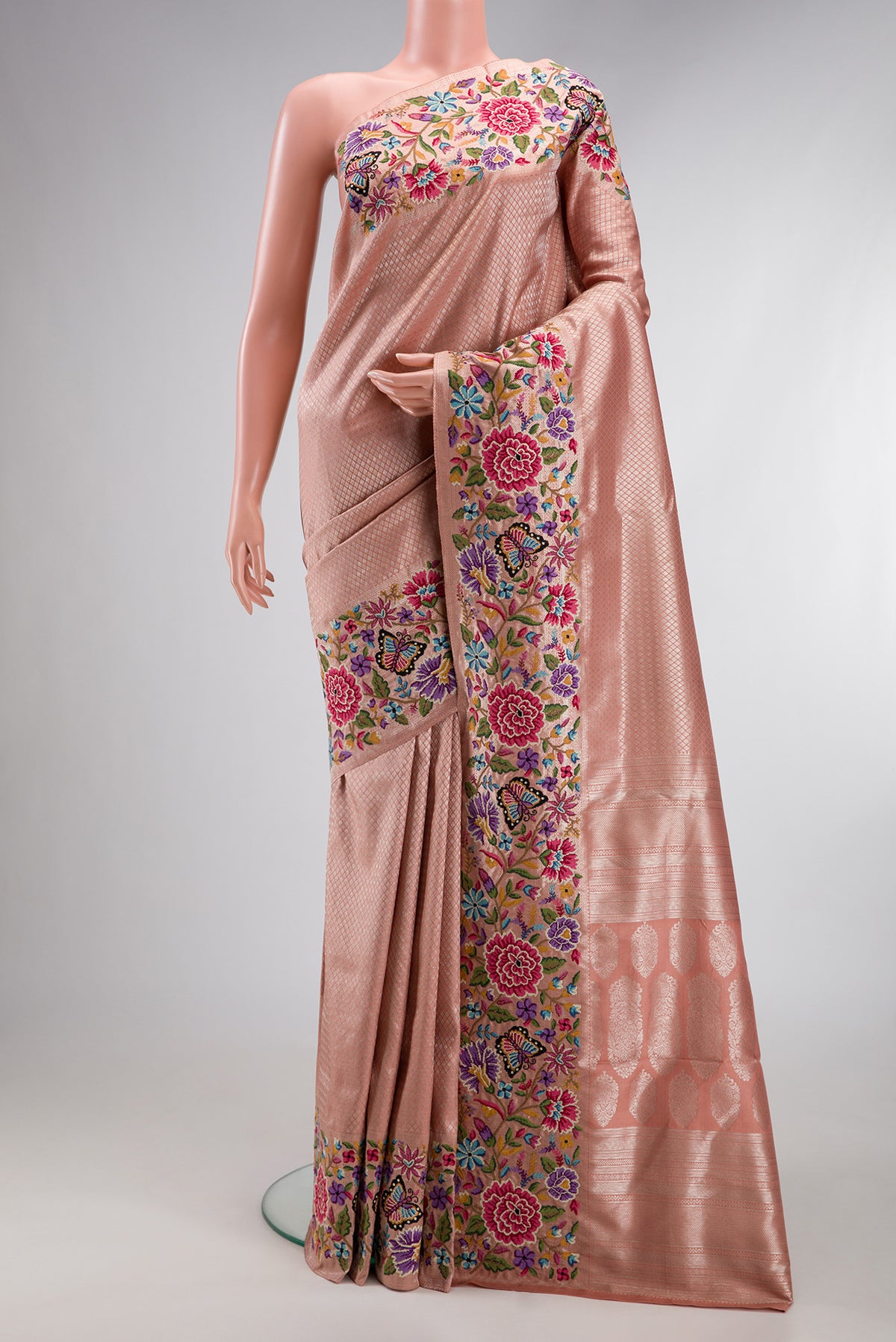 Brown Dual Tone Kanjivaram Silk Saree with Zari Brocade on the body and Embroidery Border.  displayed on a mannequin