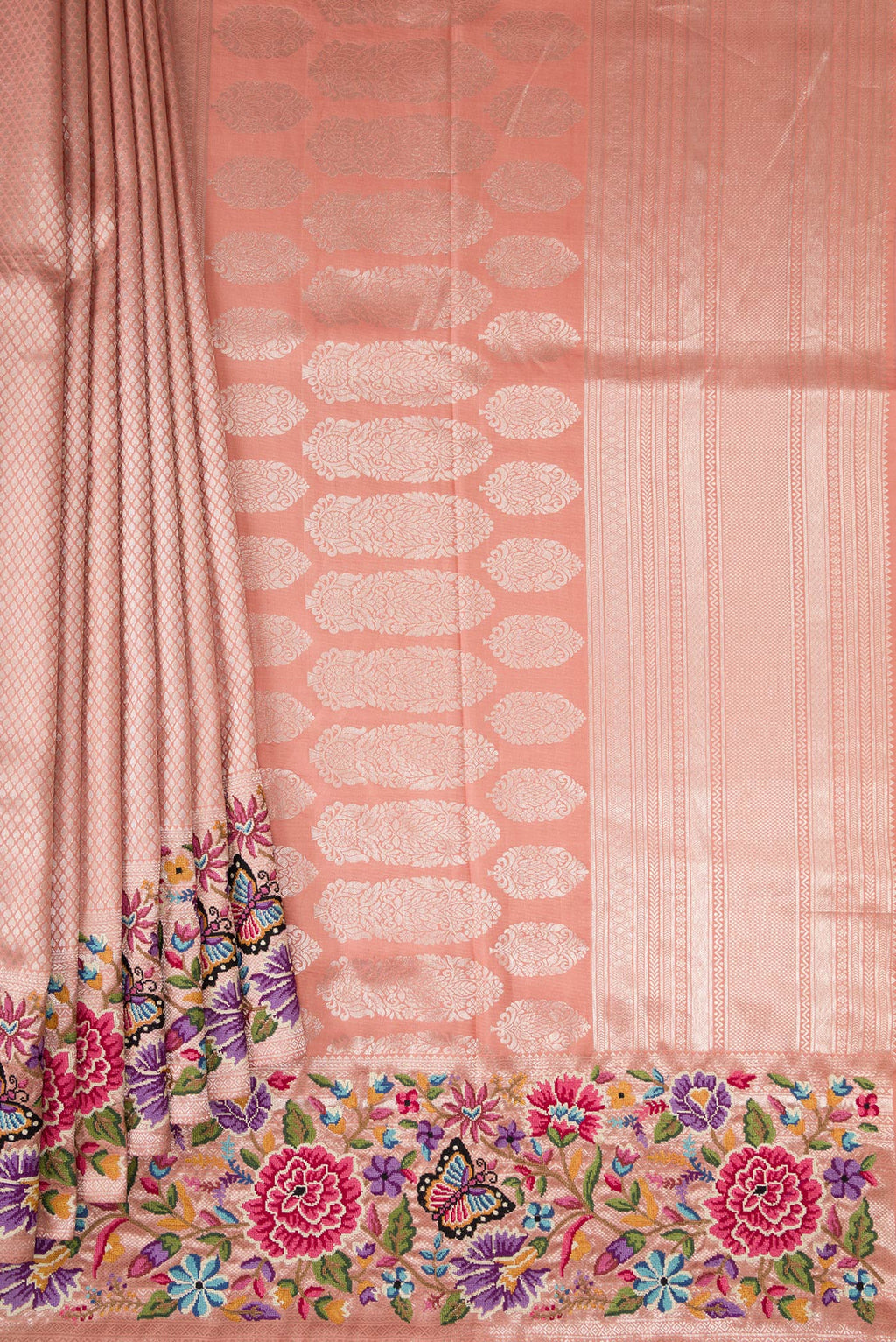 Pleats and pallu of Brown Dual Tone Kanjivaram Silk Saree with Zari Brocade on the body and Embroidery Border. 