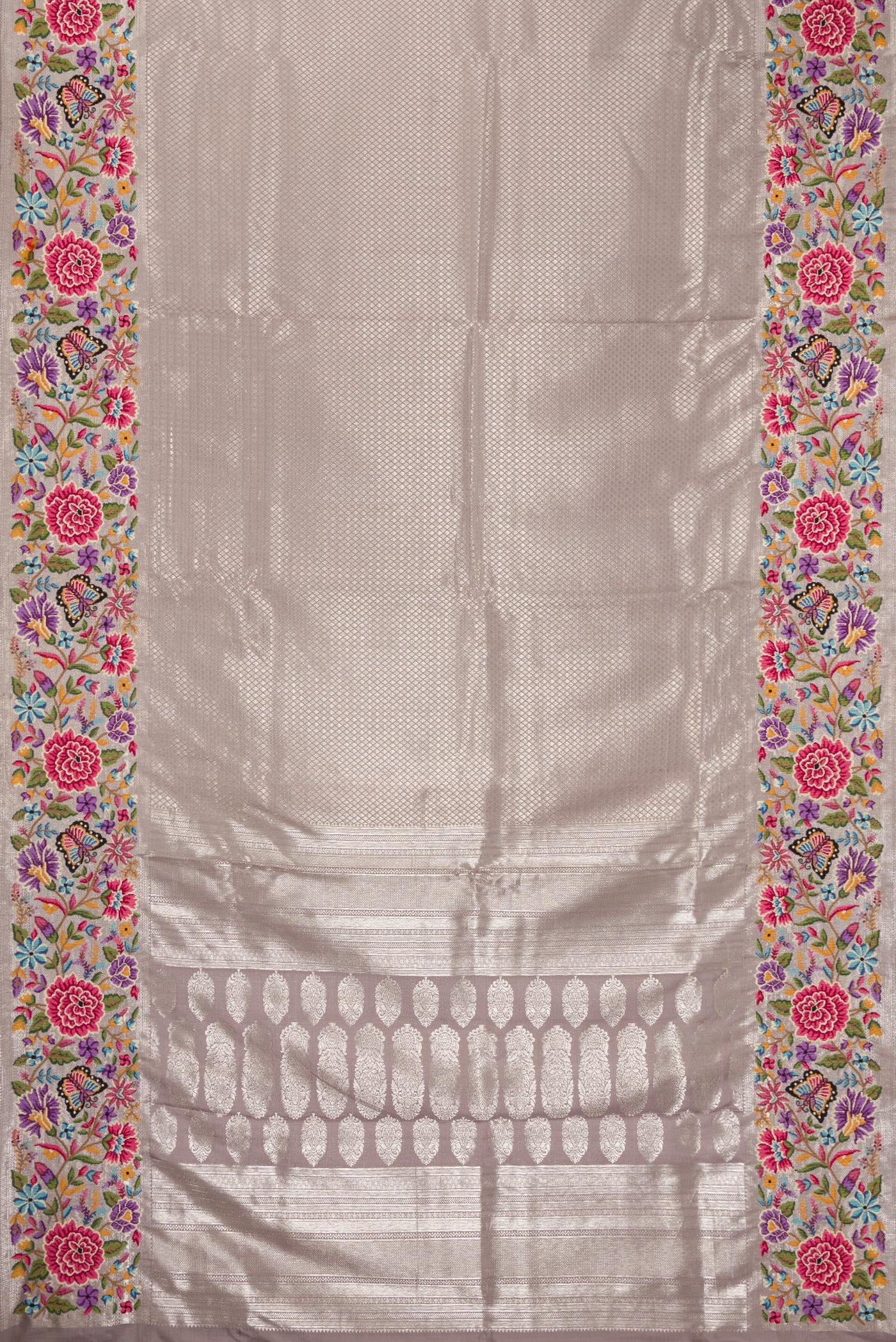 Flat view of Grey Kanjivaram Silk Saree with Zari Brocade on the body and Embroidery Border. 