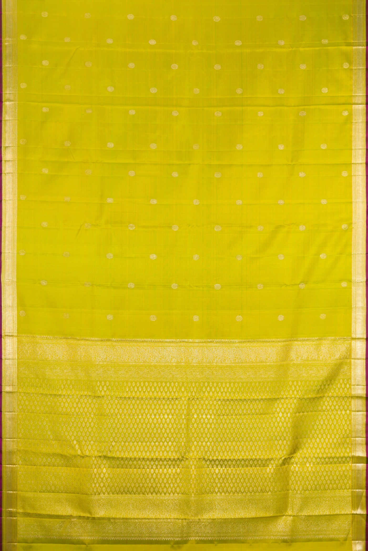 Flat view of Parrot Green Kanjivaram Silk Saree with Zari Butta on the body and Zari Border. 