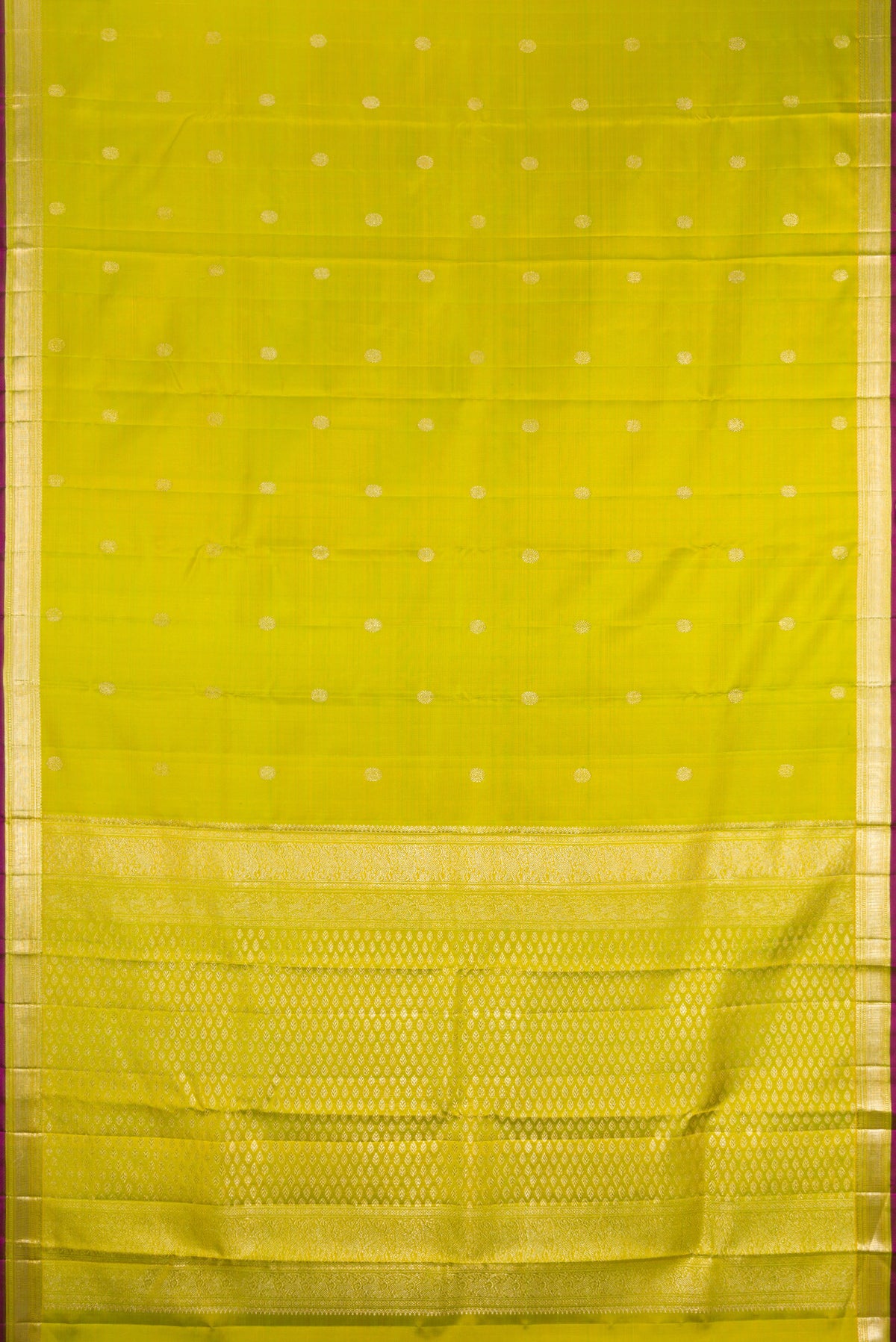 Flat view of Parrot Green Kanjivaram Silk Saree with Zari Butta on the body and Zari Border. 