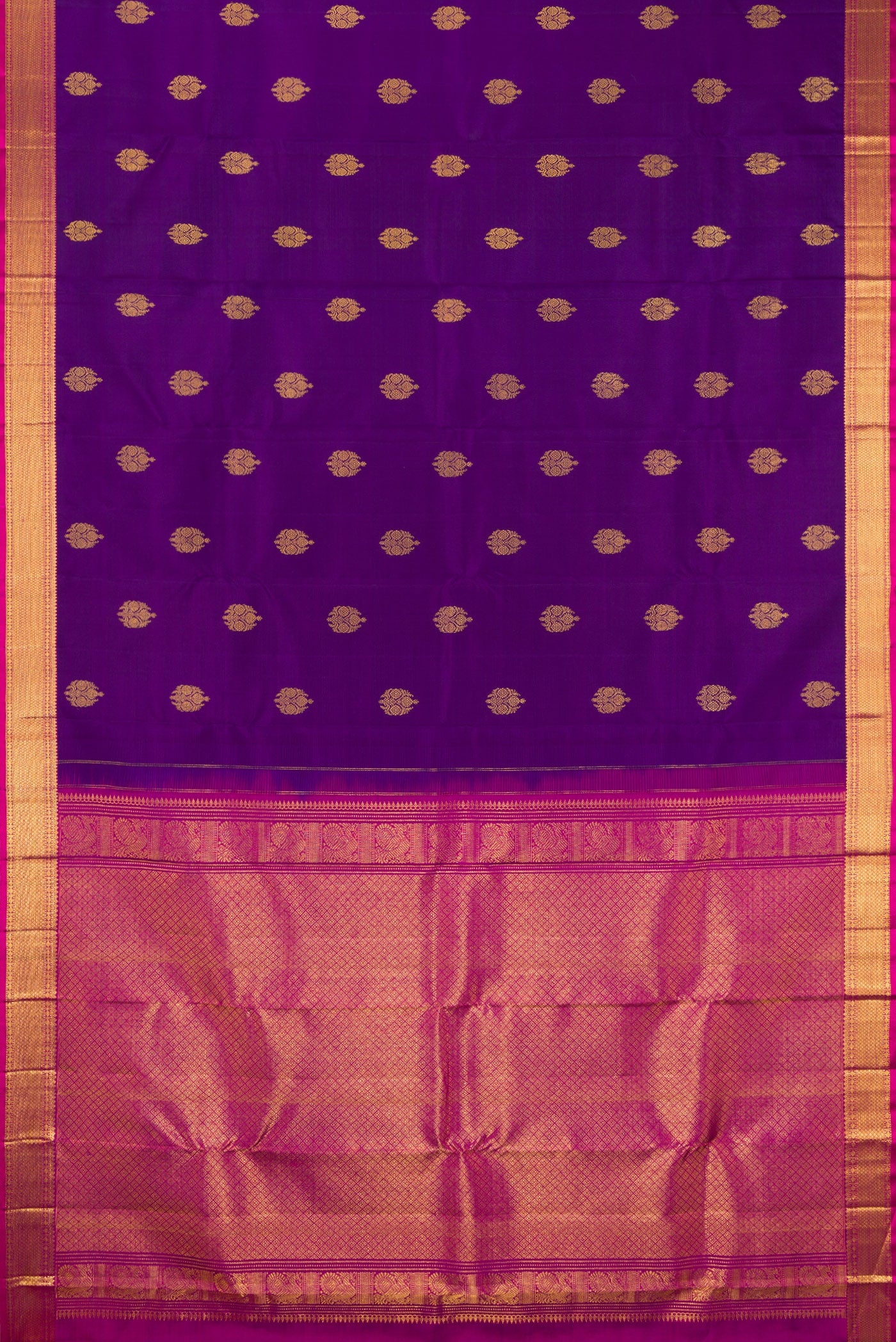 Flat view of Violet Kanjivaram Silk Saree with Zari Butta on the body and Zari Border. 