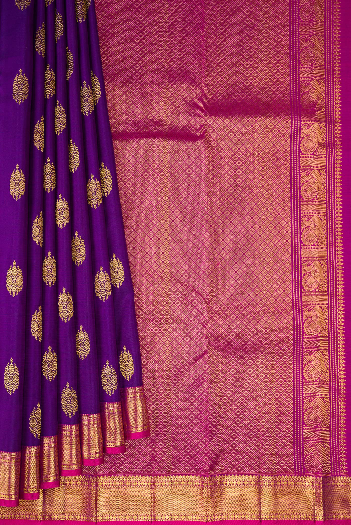 Pleats and pallu of Violet Kanjivaram Silk Saree with Zari Butta on the body and Zari Border. 