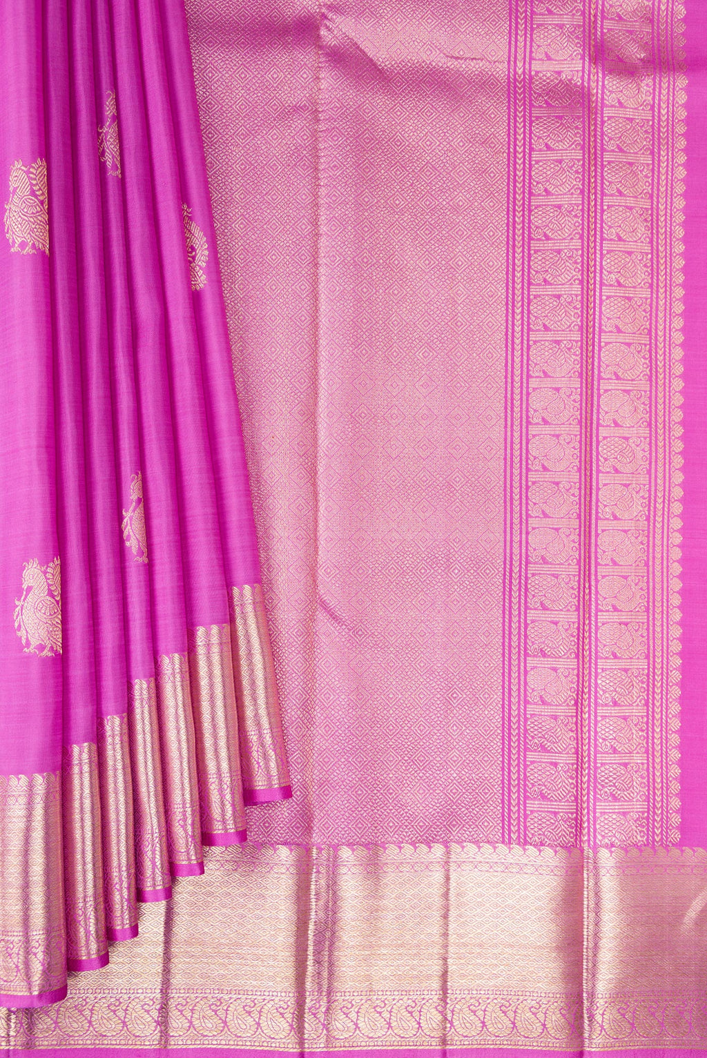 Pleats and pallu of Lavender Kanjivaram Silk Saree with Zari Butta on the body and Zari Border. 