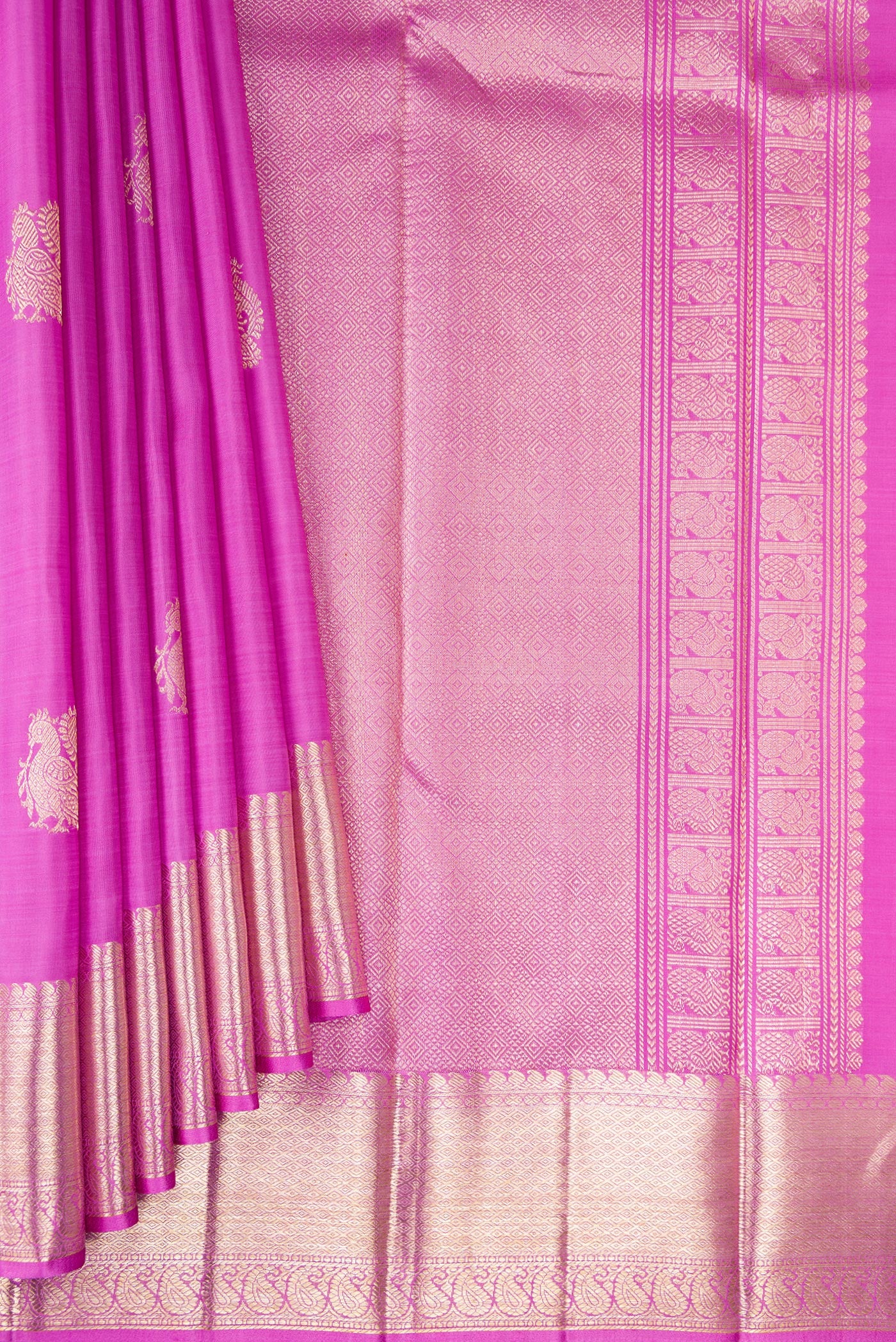 Pleats and pallu of Lavender Kanjivaram Silk Saree with Zari Butta on the body and Zari Border. 